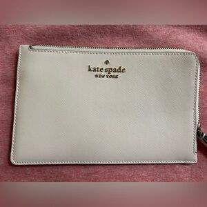 Kate Spade baby pink Wristlet with Gold Accents